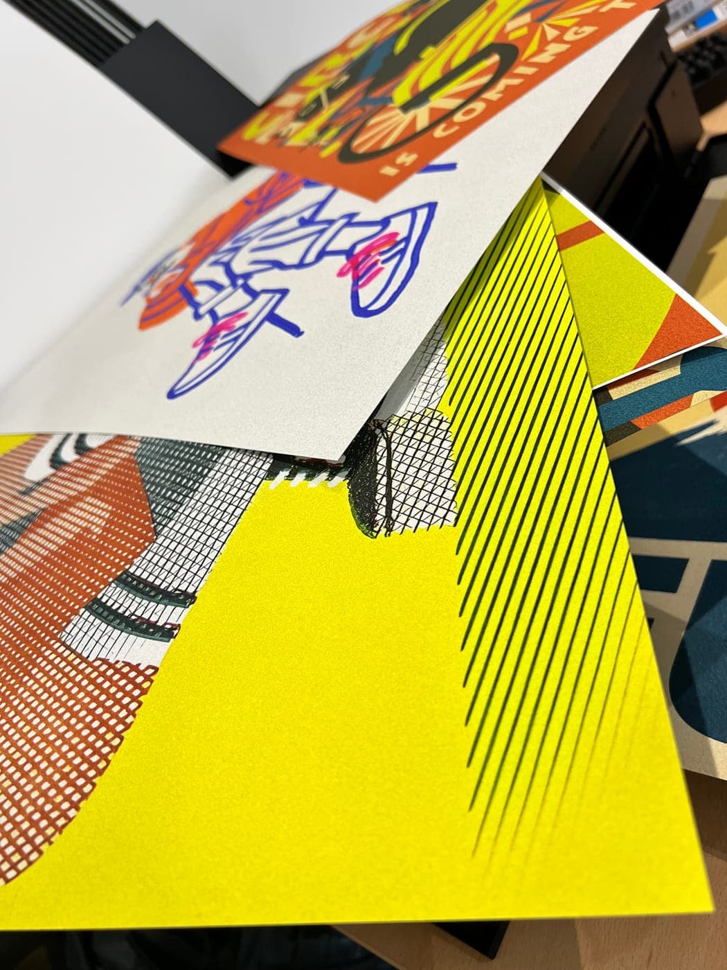 Sheets out on the desk, sketch and all.